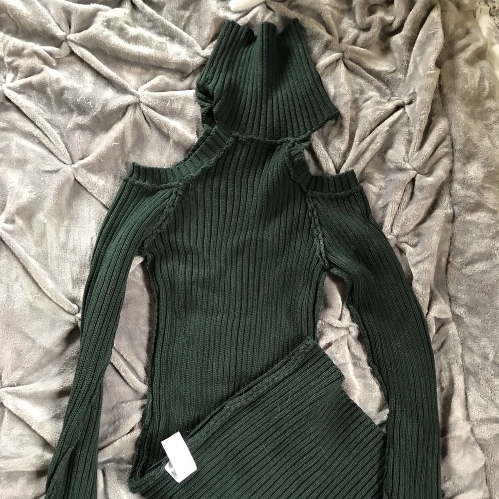 Email and green open shoulder turtleneck dress